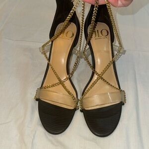 J Lo clear with gold chain strap Size 8 1/2 M black